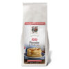 Keto Pancake mix packaging front, showing prepared pancakes and text "2g Net Carbs, 17 g Protein, No Sugar Added" and "Keto Pancake & Waffle Mix with No artificial flavors or sweeteners; OU D (Kosher dairy), Non-GMO; Net Weight 9 oz (255g)"