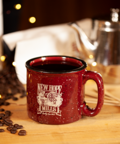 New Hope Mills red mug with coffee