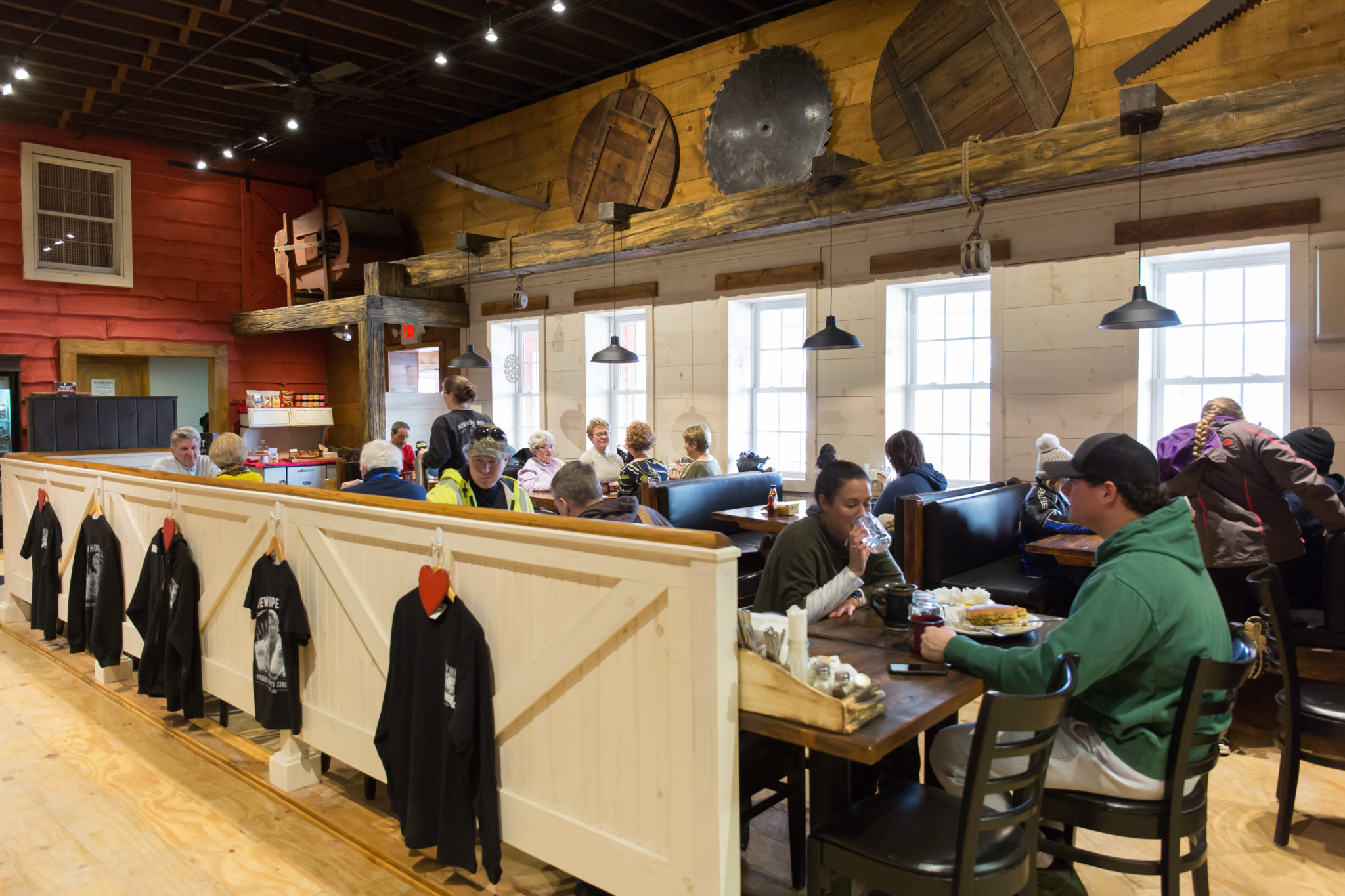 Photo New Hope Mills Cafe' and Store interior, with people sitting down eating