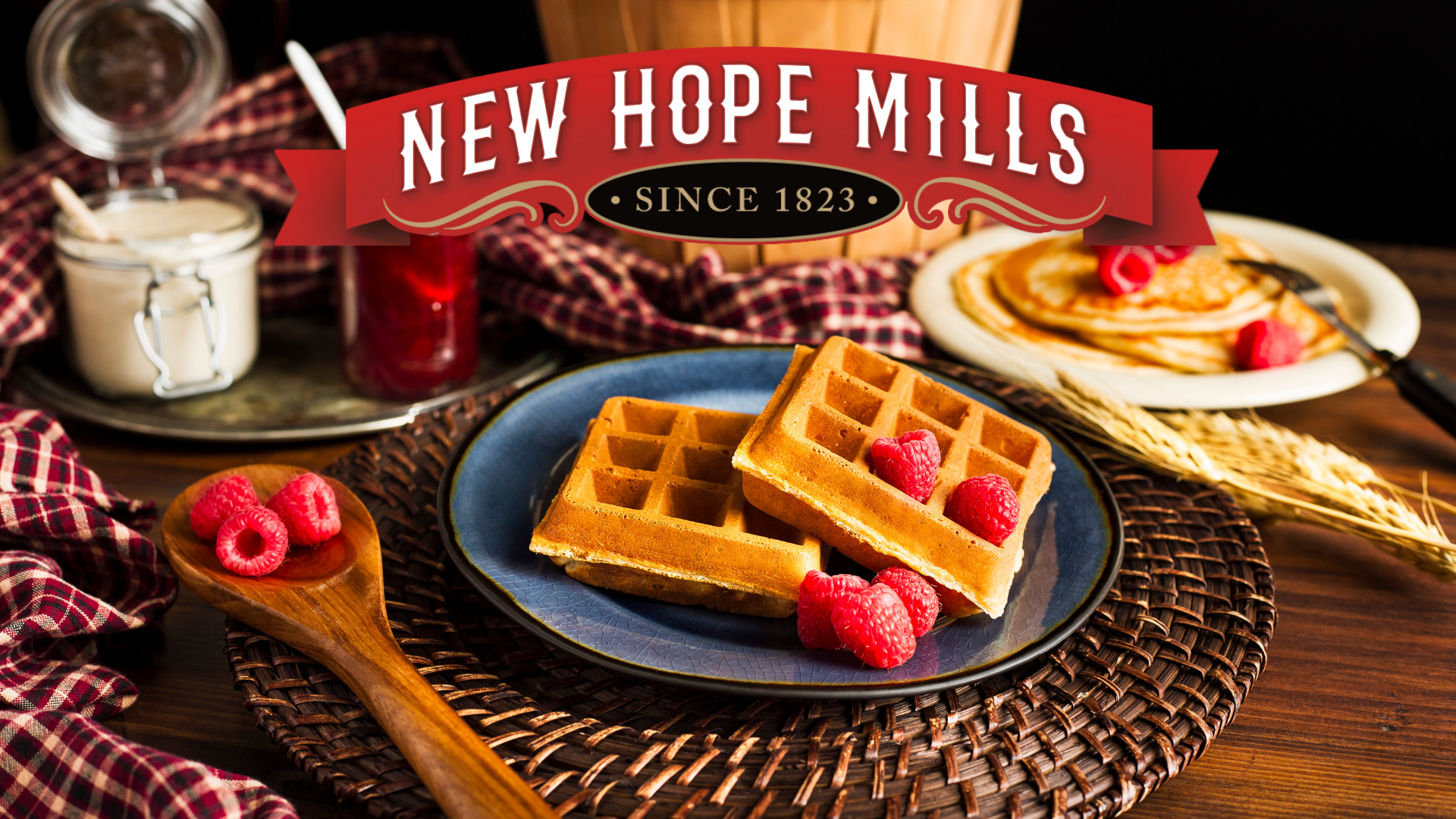 New Hope Mills Cafe' and Store graphic; "New Hope Mills. Since 1823" text with waffles and raspberries in the photo