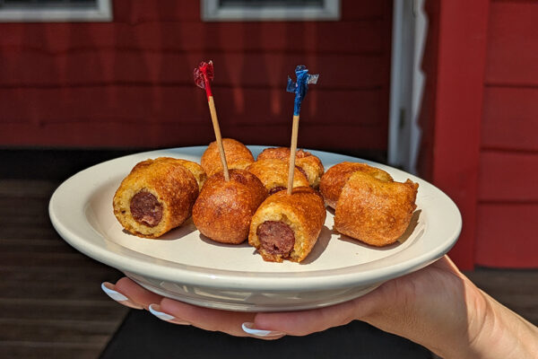 Photo of Corn Jerkies, in-store samples for the "Turning 200" July Corn Dogs special menu item